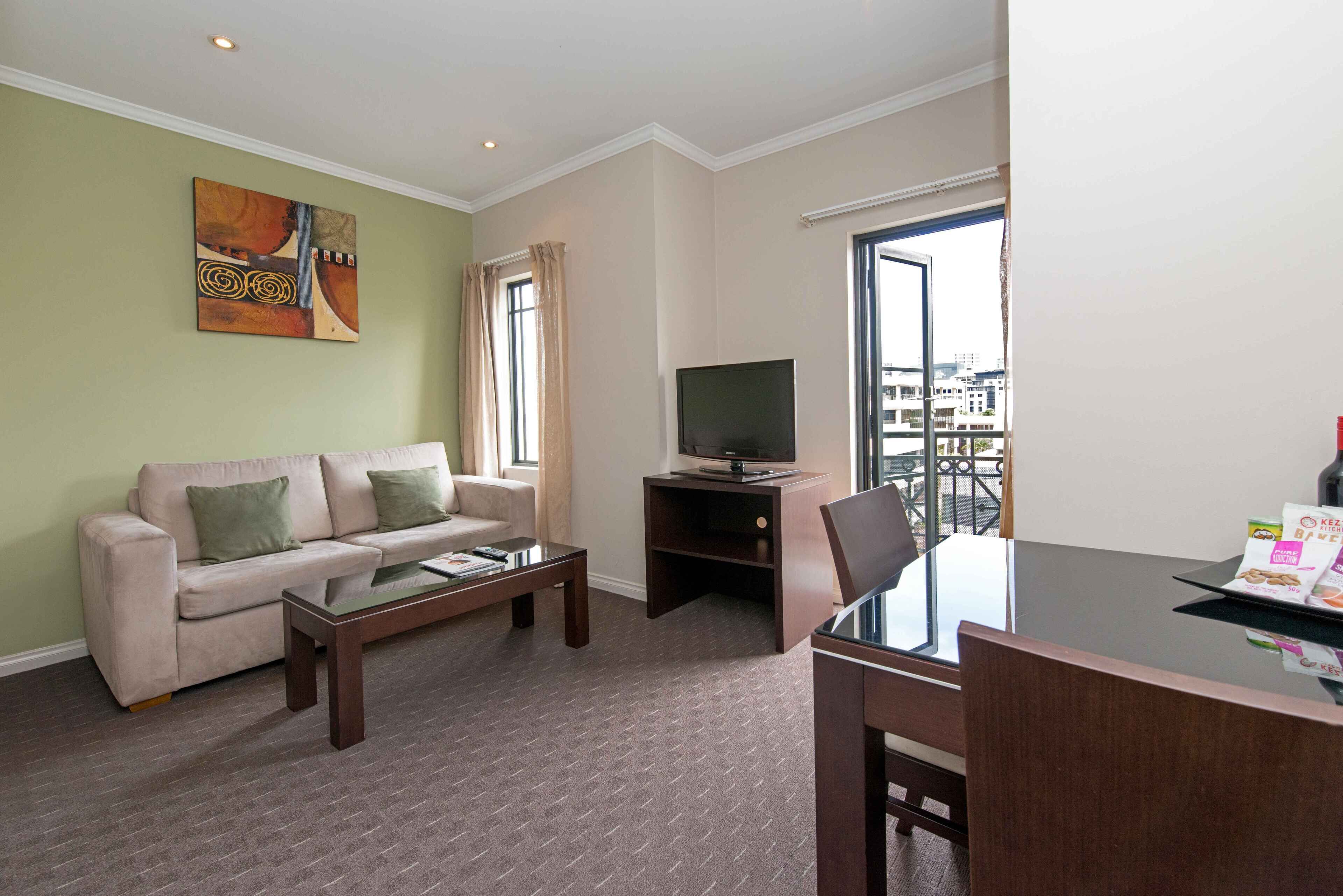 city studio | desk, laptop workspace, iron/ironing board, cots/infant beds