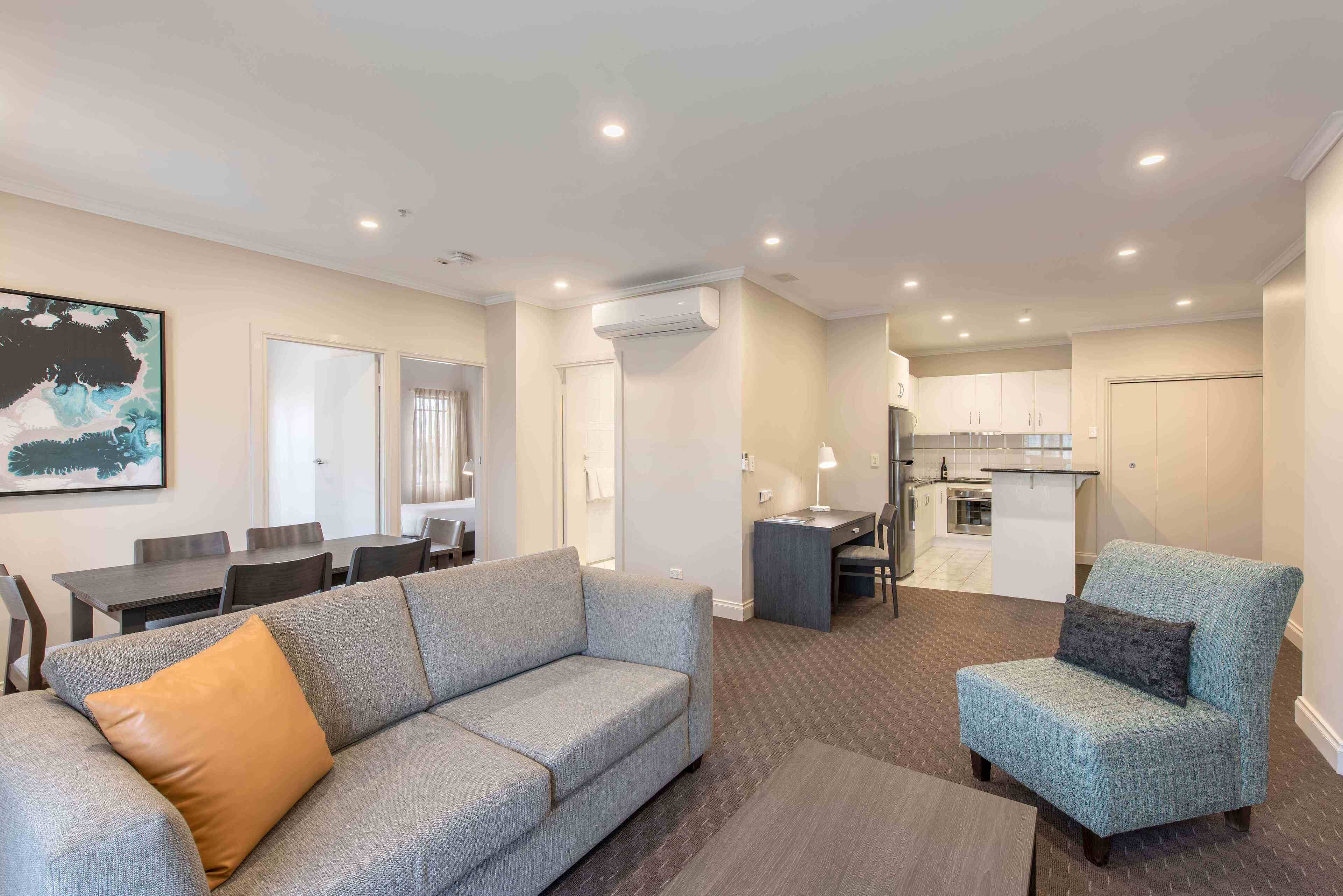 apartment, 2 bedrooms (queen and single) | living area | 42-inch lcd tv with cable channels, tv