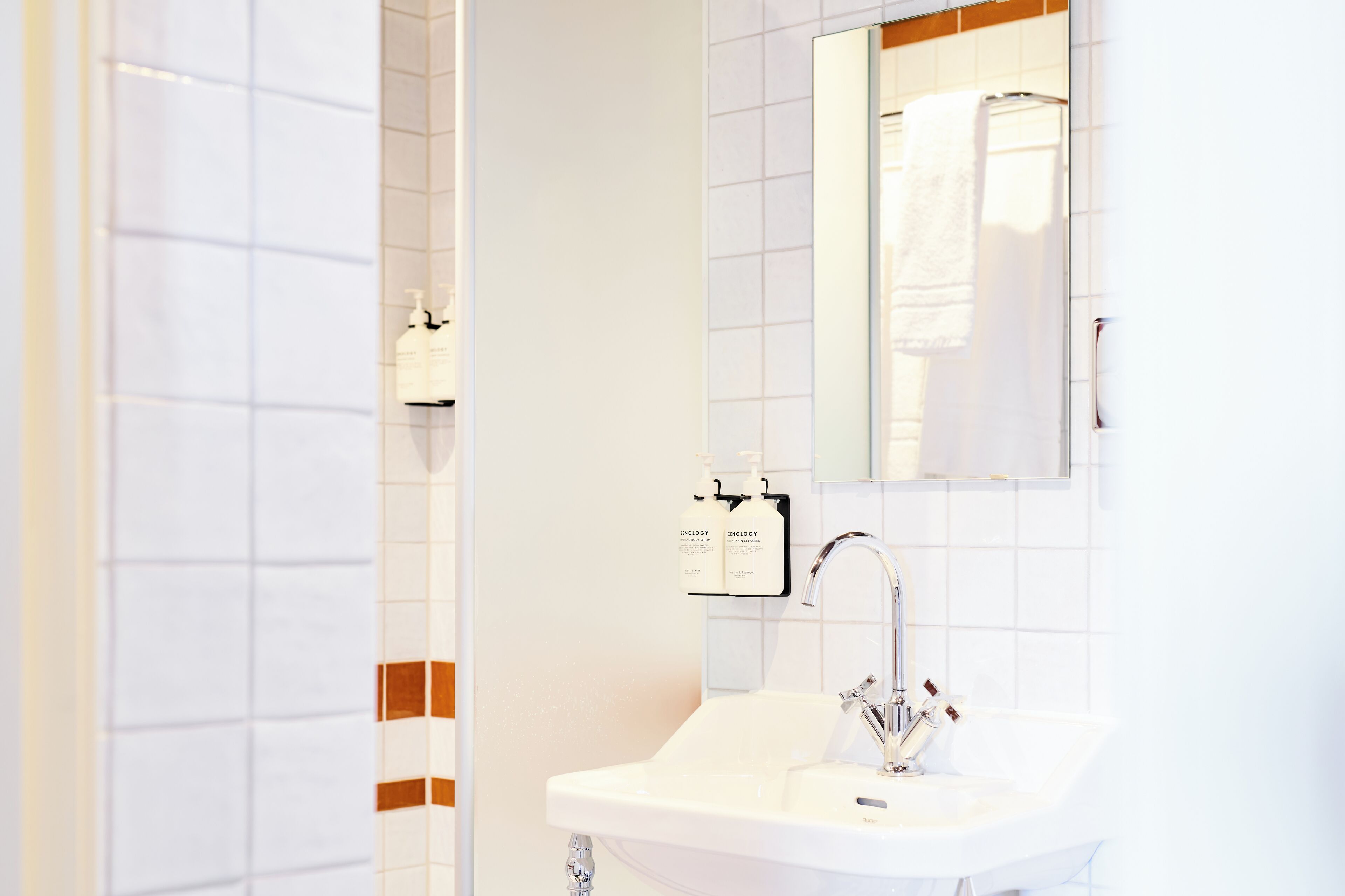 comfy room | bathroom | designer toiletries, hair dryer, bathrobes, slippers