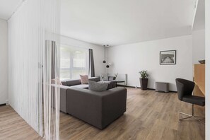 Family Room, Multiple Beds, Non Smoking (Separate Living Room) | 1 bedroom, desk, laptop workspace, blackout drapes