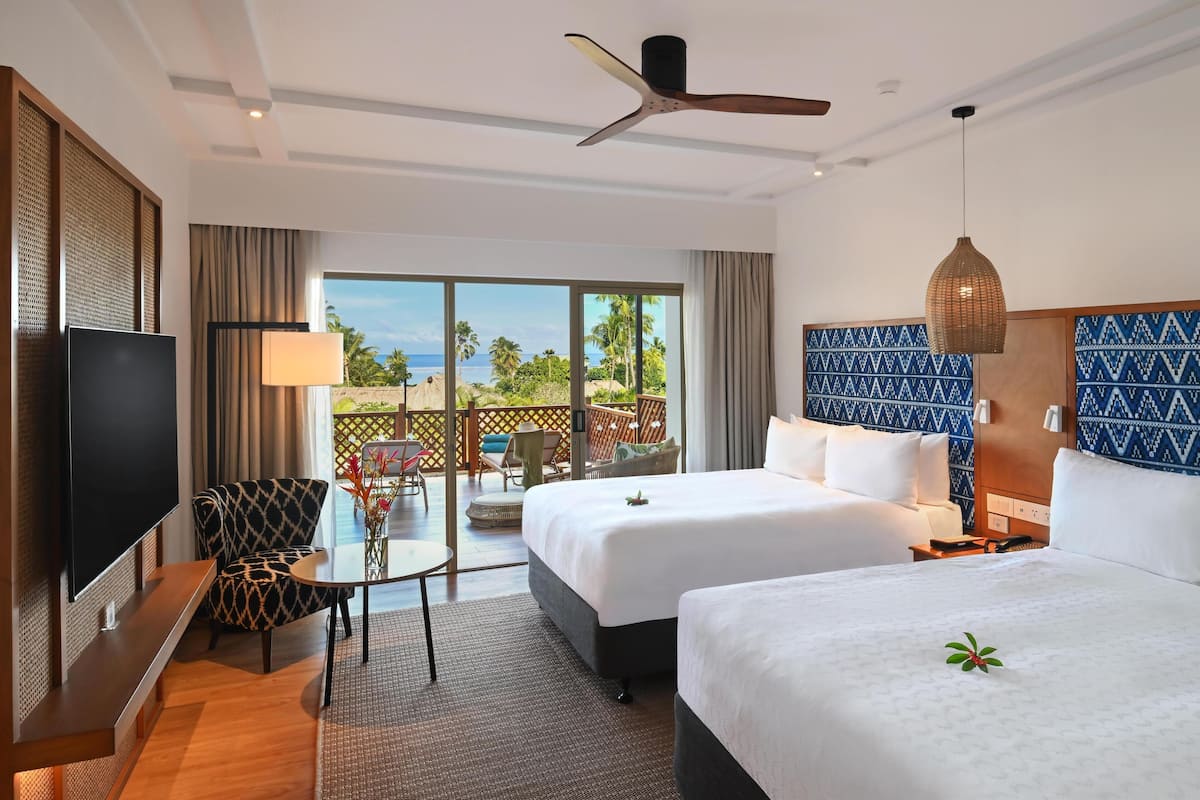Habitación, varias camas, vista al resort (Courtyard) | Ropa de cama hipoalergénica y minibar