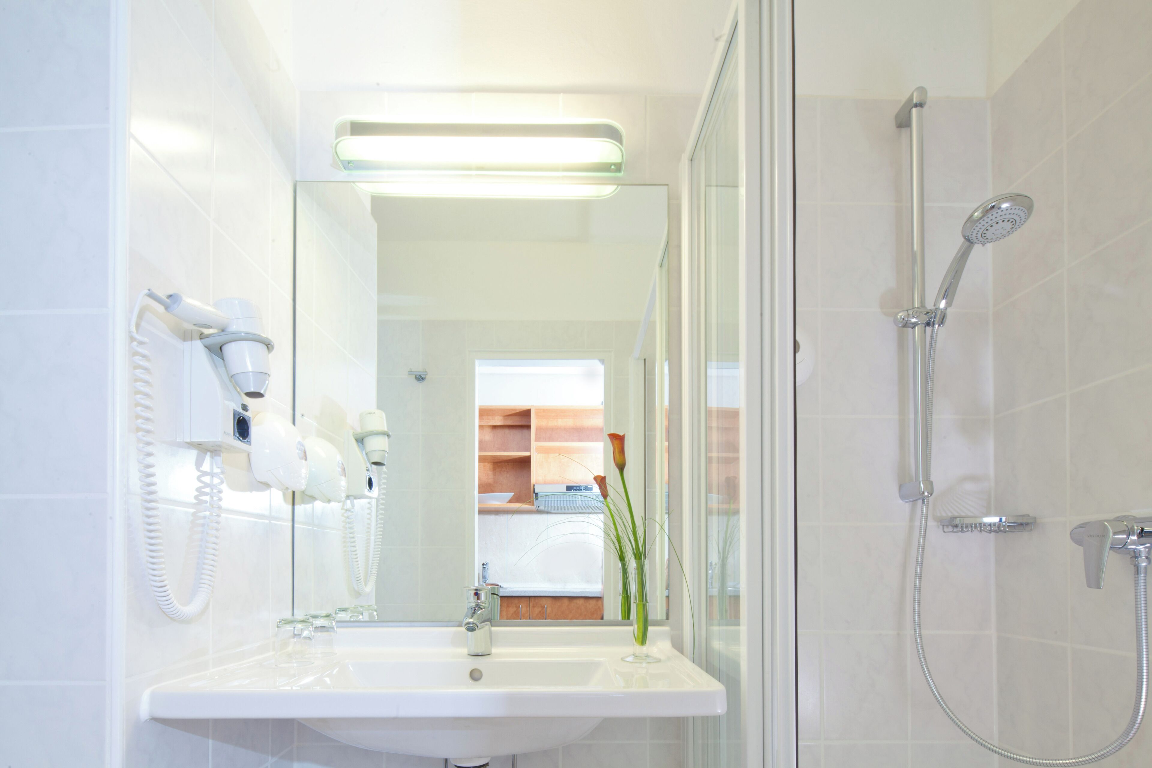 shower, free toiletries, hair dryer, slippers