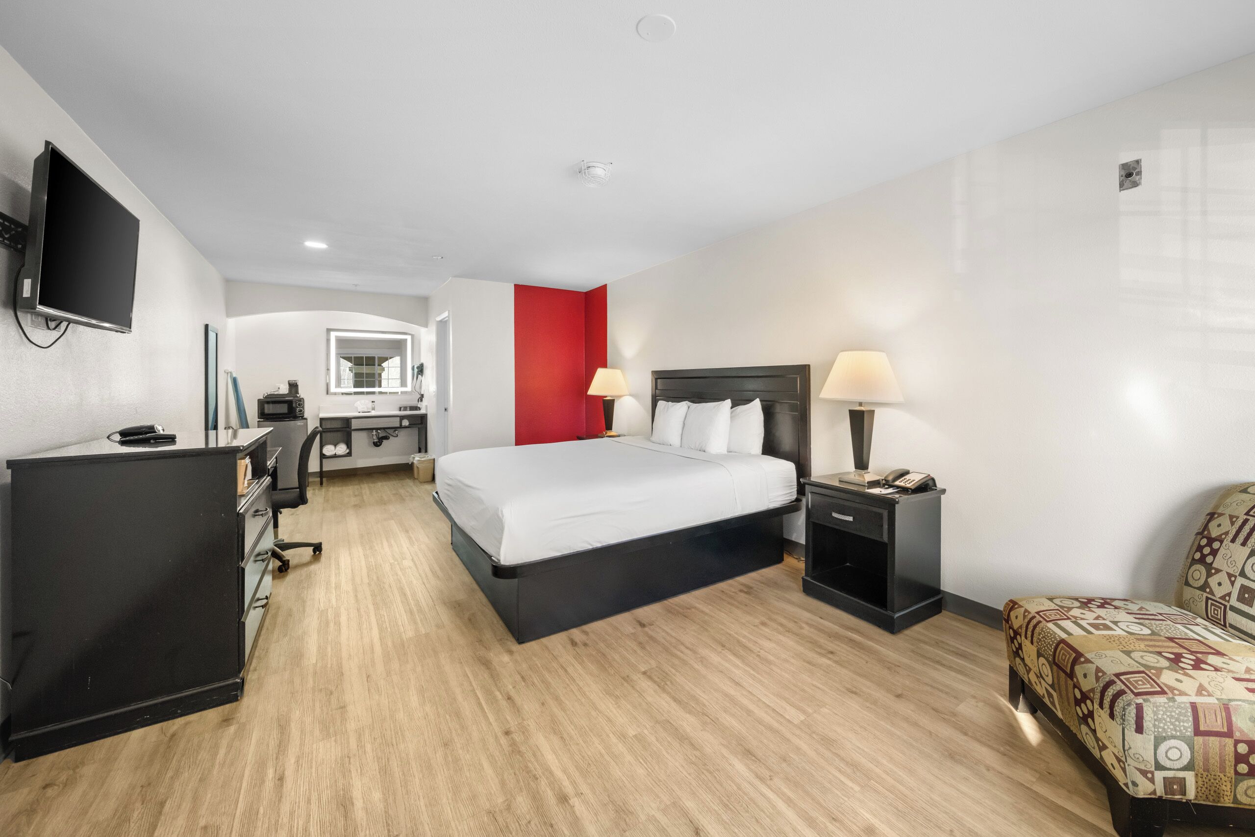 Room, 1 King Bed, Non Smoking | In-room safe, desk, blackout drapes, iron/ironing board