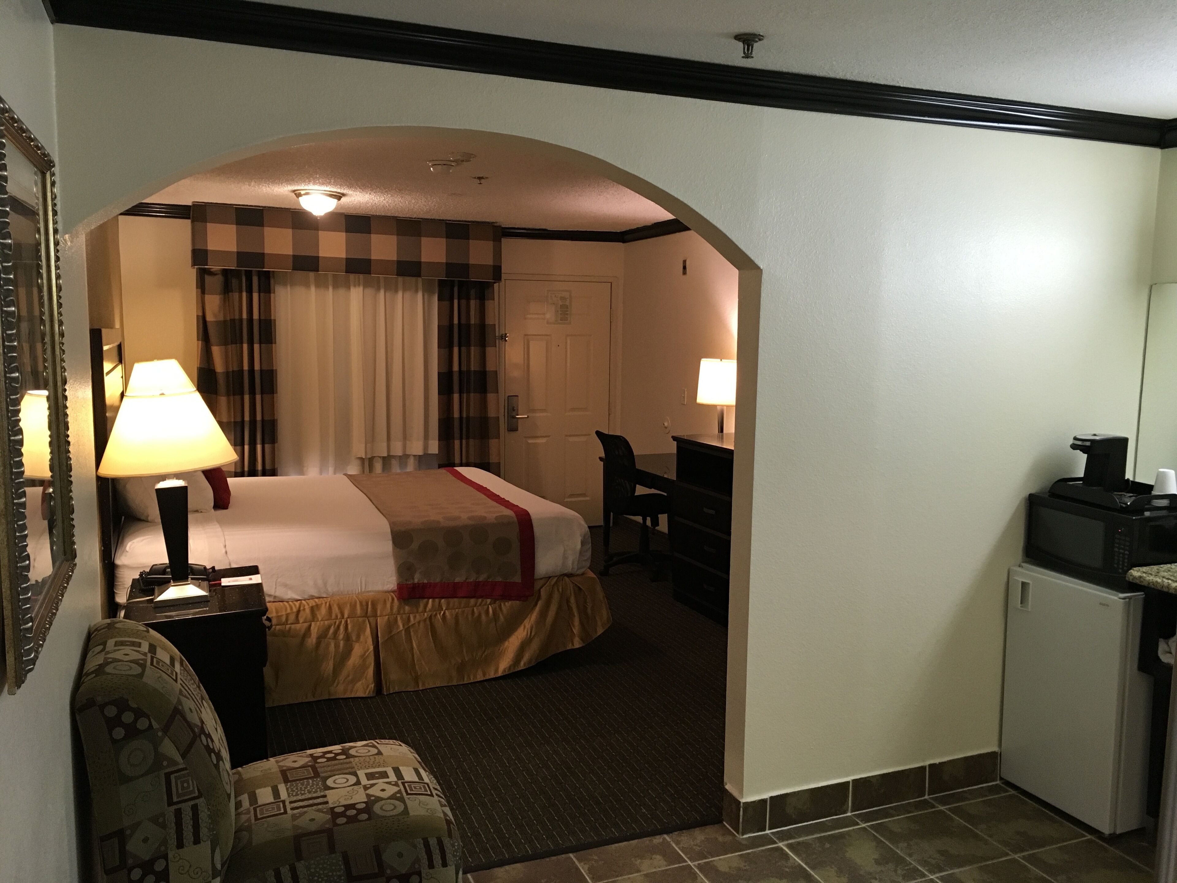 deluxe studio suite, 1 king bed, non smoking, jetted tub | in-room safe, desk, blackout curtains, iron/ironing board