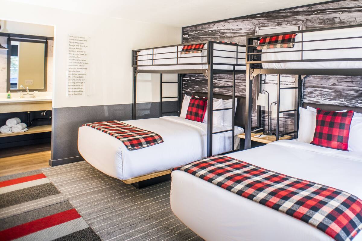 Deluxe Room (Two twin over queen bunk) | Down comforters, desk, laptop workspace, blackout drapes