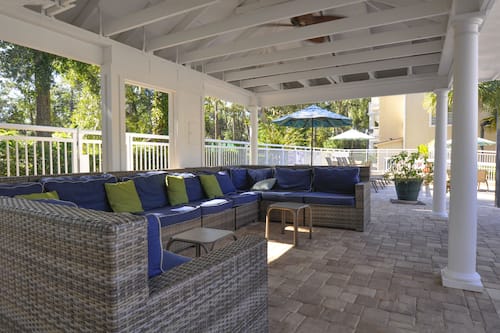 Seasonal outdoor pool, pool umbrellas, pool loungers