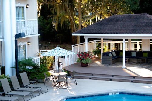 Seasonal outdoor pool, pool umbrellas, pool loungers