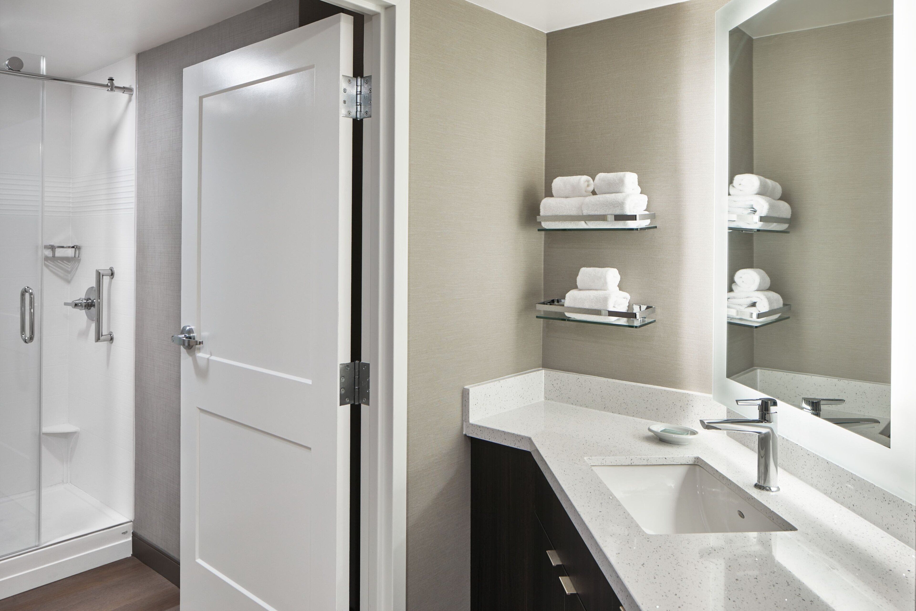 hydromassage showerhead, hair dryer, towels, soap