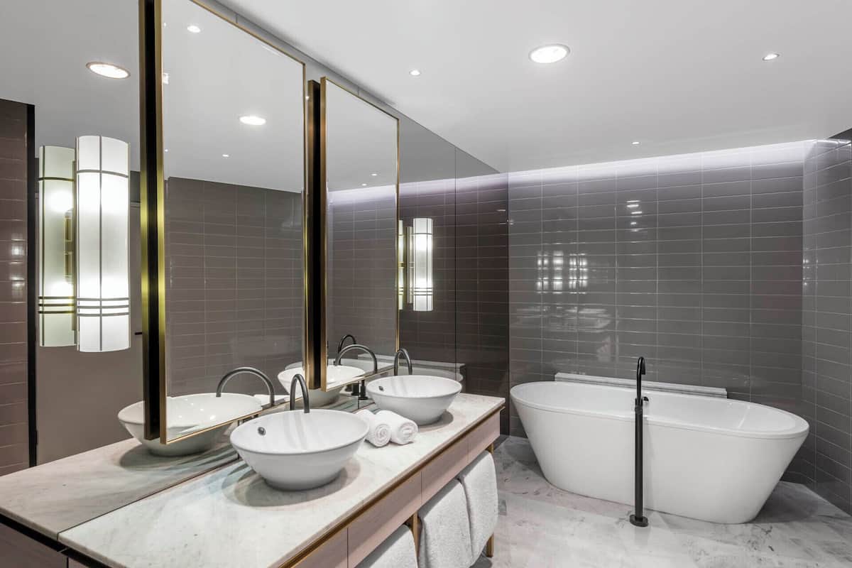 paradox executive suite | bathroom | shower, eco-friendly toiletries, hair dryer, bathrobes