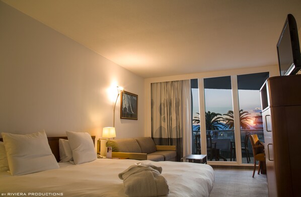 Ropa de cama de alta calidad, minibar, caja fuerte y escritorio