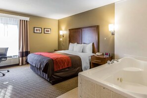 Habitació, 1 llit de matrimoni gran, no fumadors, banyera d'hidromassatge | Roba de llit d'alta qualitat i matalassos amb encoixinament addicional 