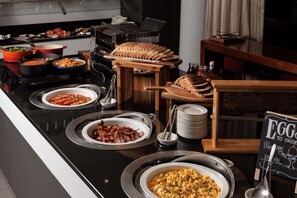 Daily buffet breakfast (AUD 23 per person)