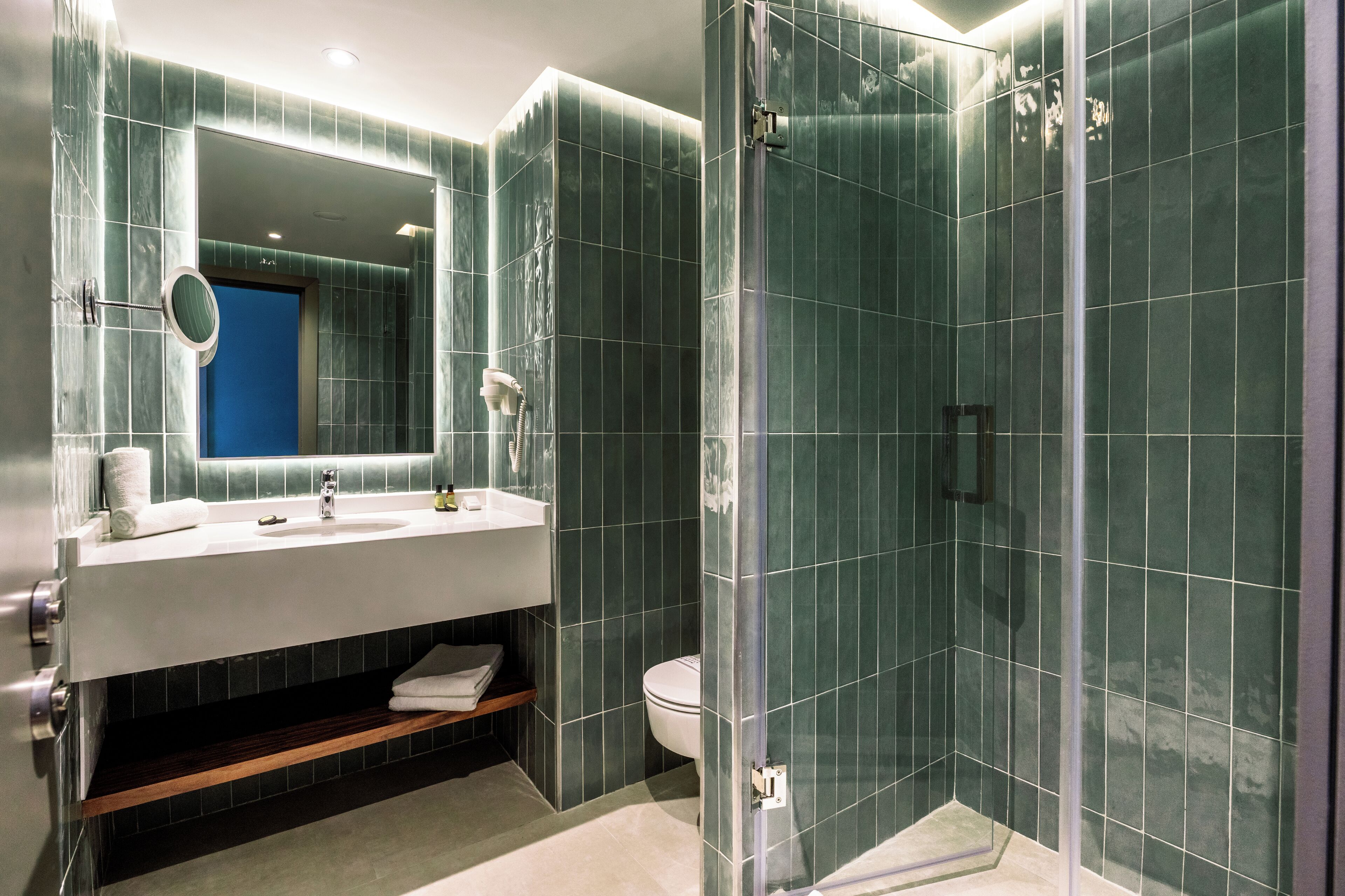 Eco-friendly toiletries, hair dryer, towels