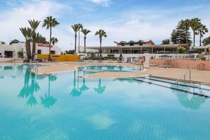Outdoor pool, pool umbrellas, sun loungers