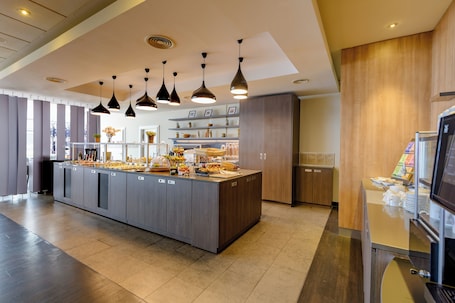 Daily buffet breakfast (EUR 25 per person)