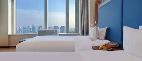 Luxe beddengoed, donsdekens, een minibar, een kluis op de kamer