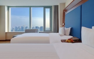 Premium bedding, down duvets, minibar, in-room safe