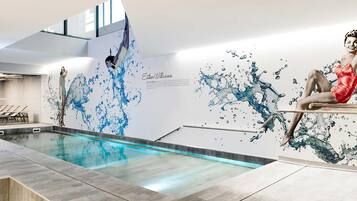 Indoor pool, open 6:00 AM to 10:00 PM, pool loungers