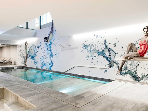 Indoor pool, open 6:00 AM to 10:00 PM, pool loungers