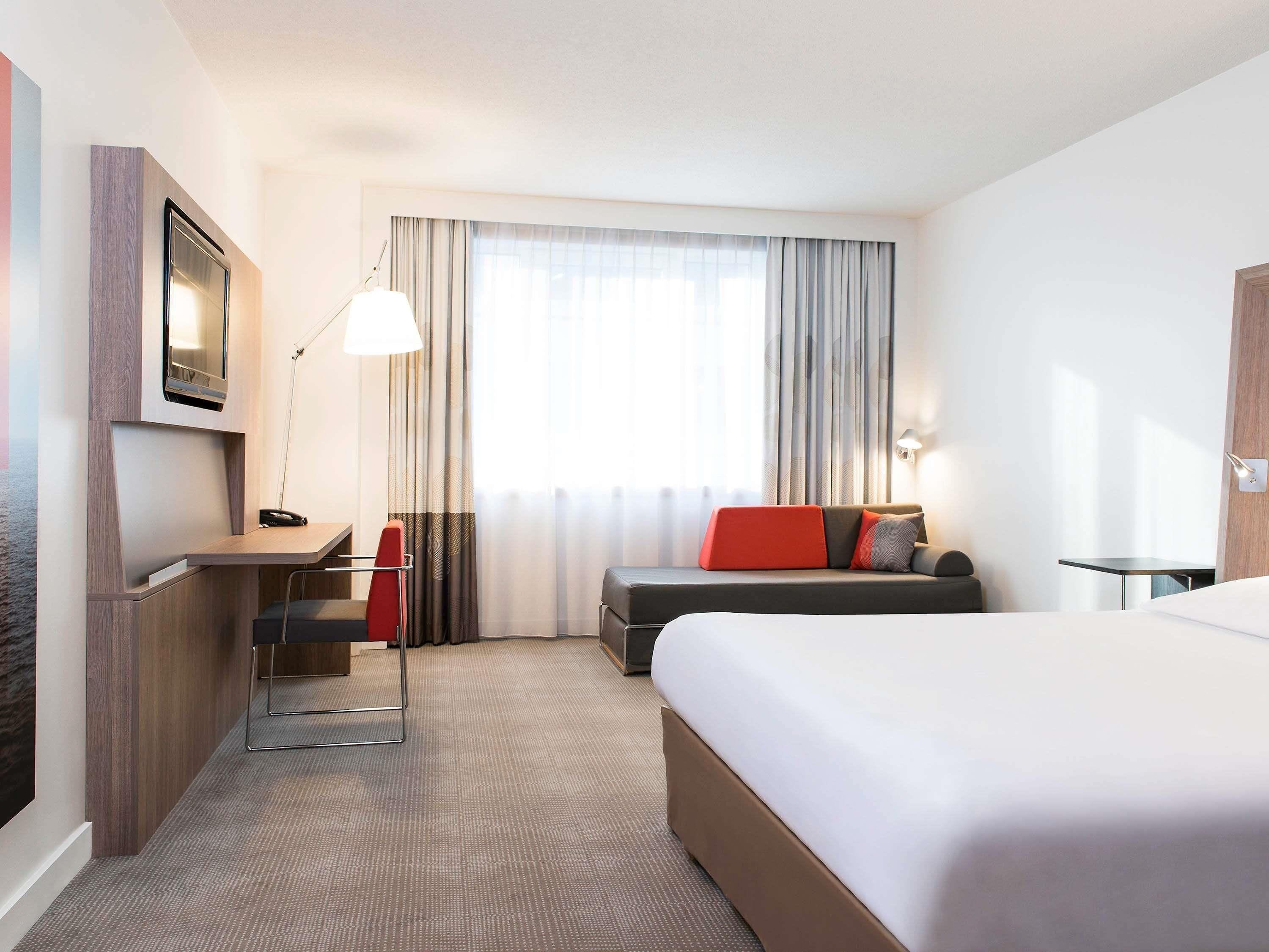 Hypo-allergenic bedding, free minibar items, in-room safe, desk