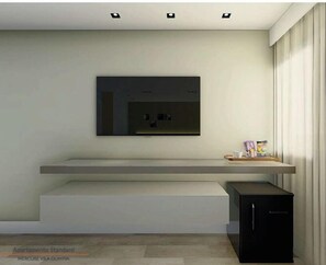 1 غرفة نوم وملاءات للفراش لا تسبب الحساسية وميني بار وخزنة داخل الغرفة