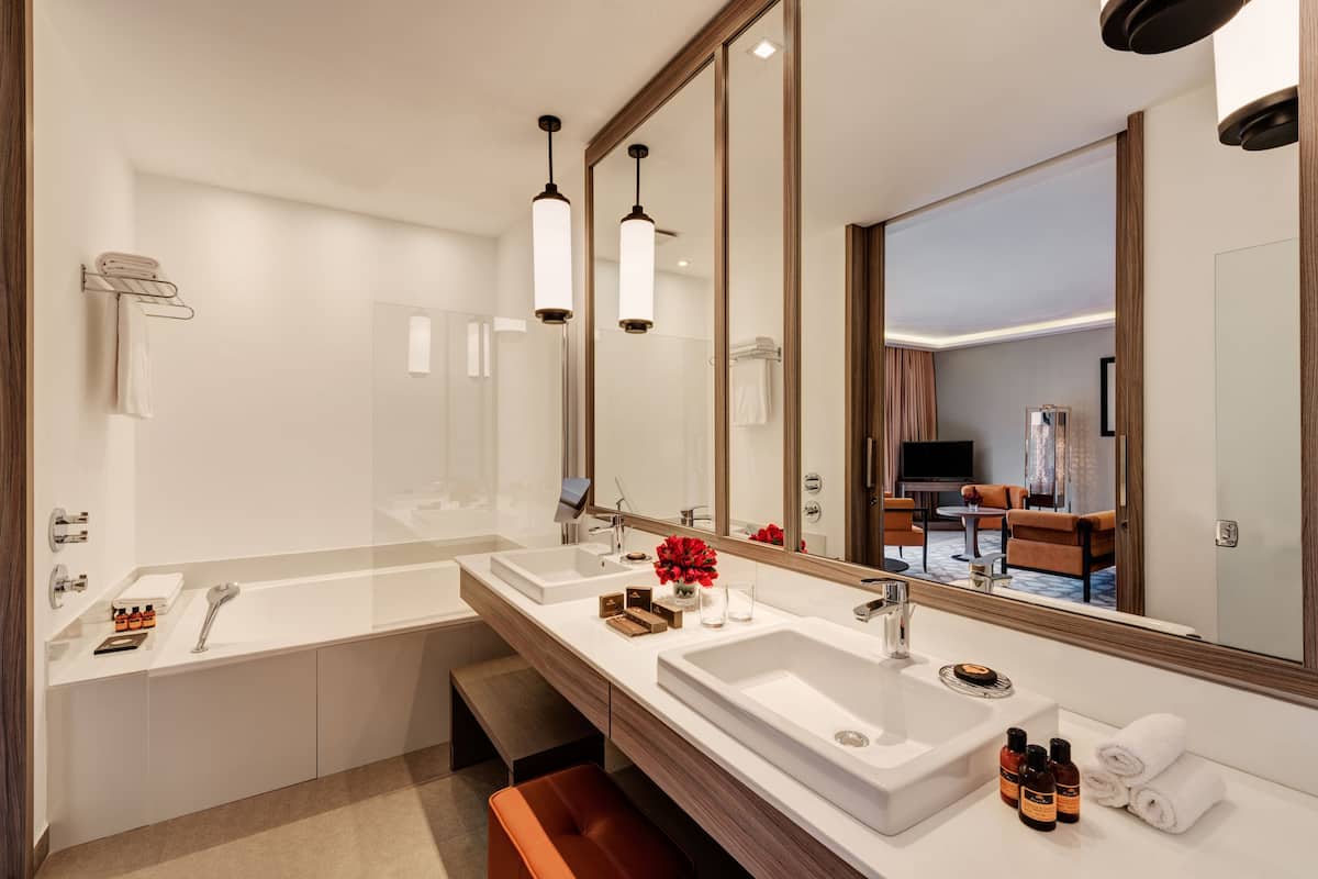 eco-friendly toiletries, hair dryer, bathrobes, slippers