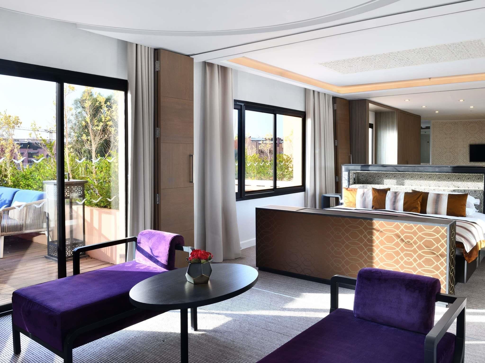 Signature Penthouse, 2 Bedrooms | Minibar, in-room safe, desk, laptop workspace