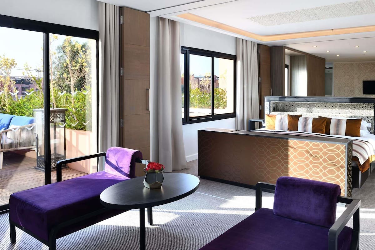 Signature Penthouse, 2 Bedrooms | Minibar, in-room safe, desk, laptop workspace