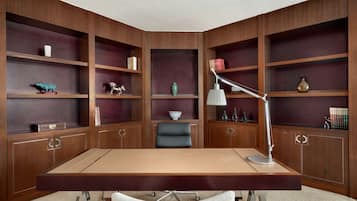 Work in style with a central desk and comfortable office chair.