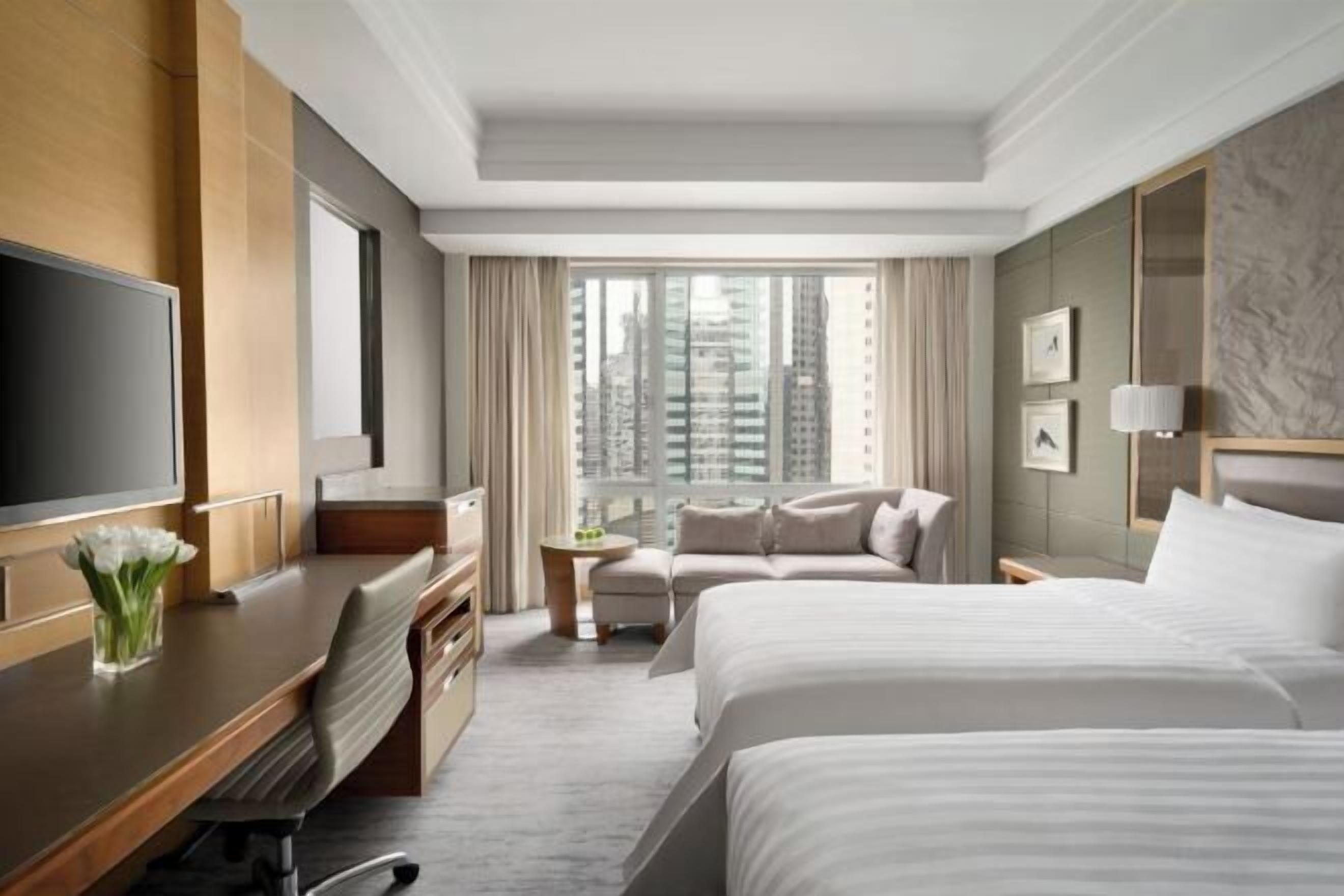 Hypo-allergenic bedding, down comforters, minibar, in-room safe