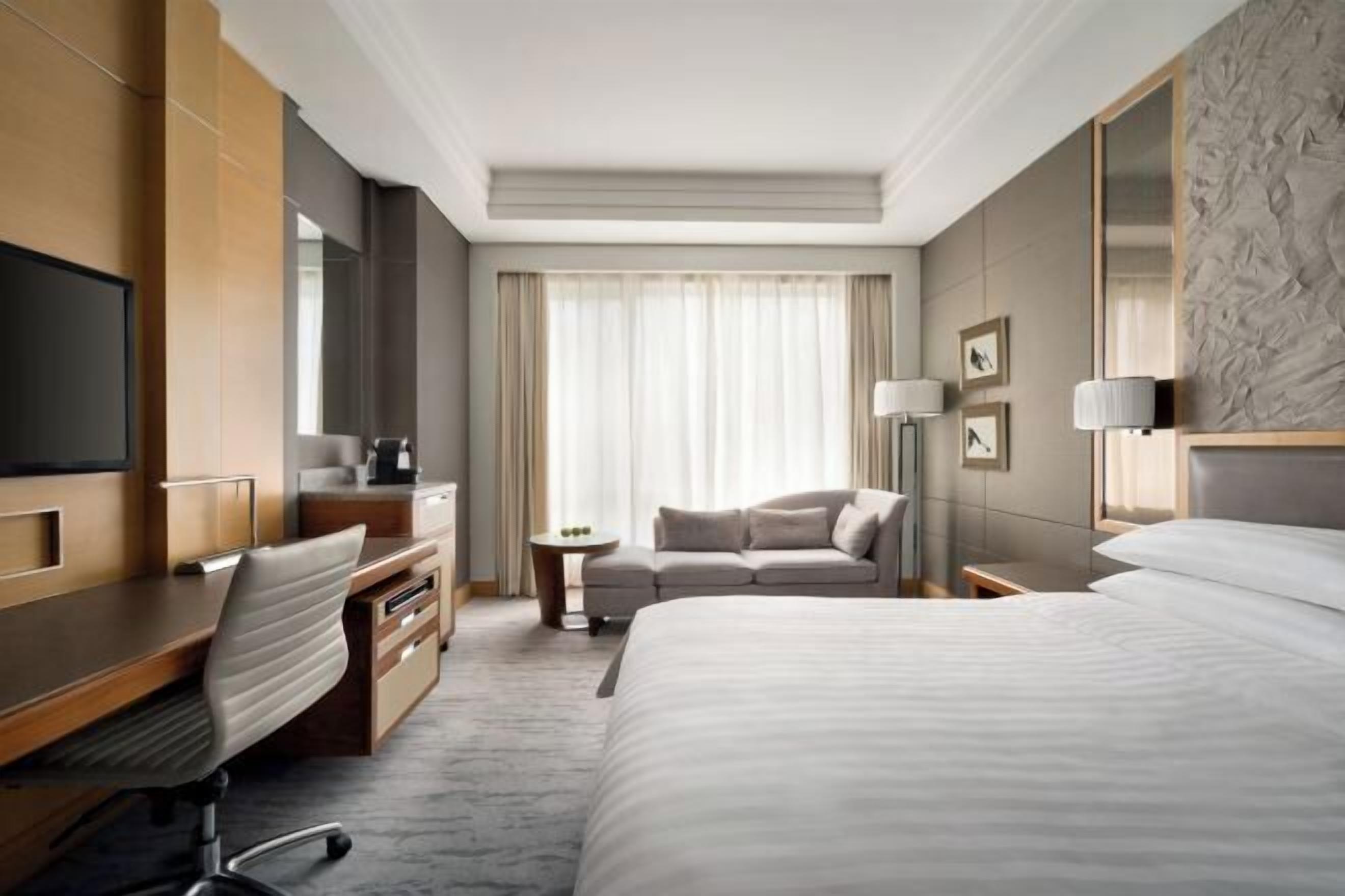 Hypo-allergenic bedding, down comforters, minibar, in-room safe
