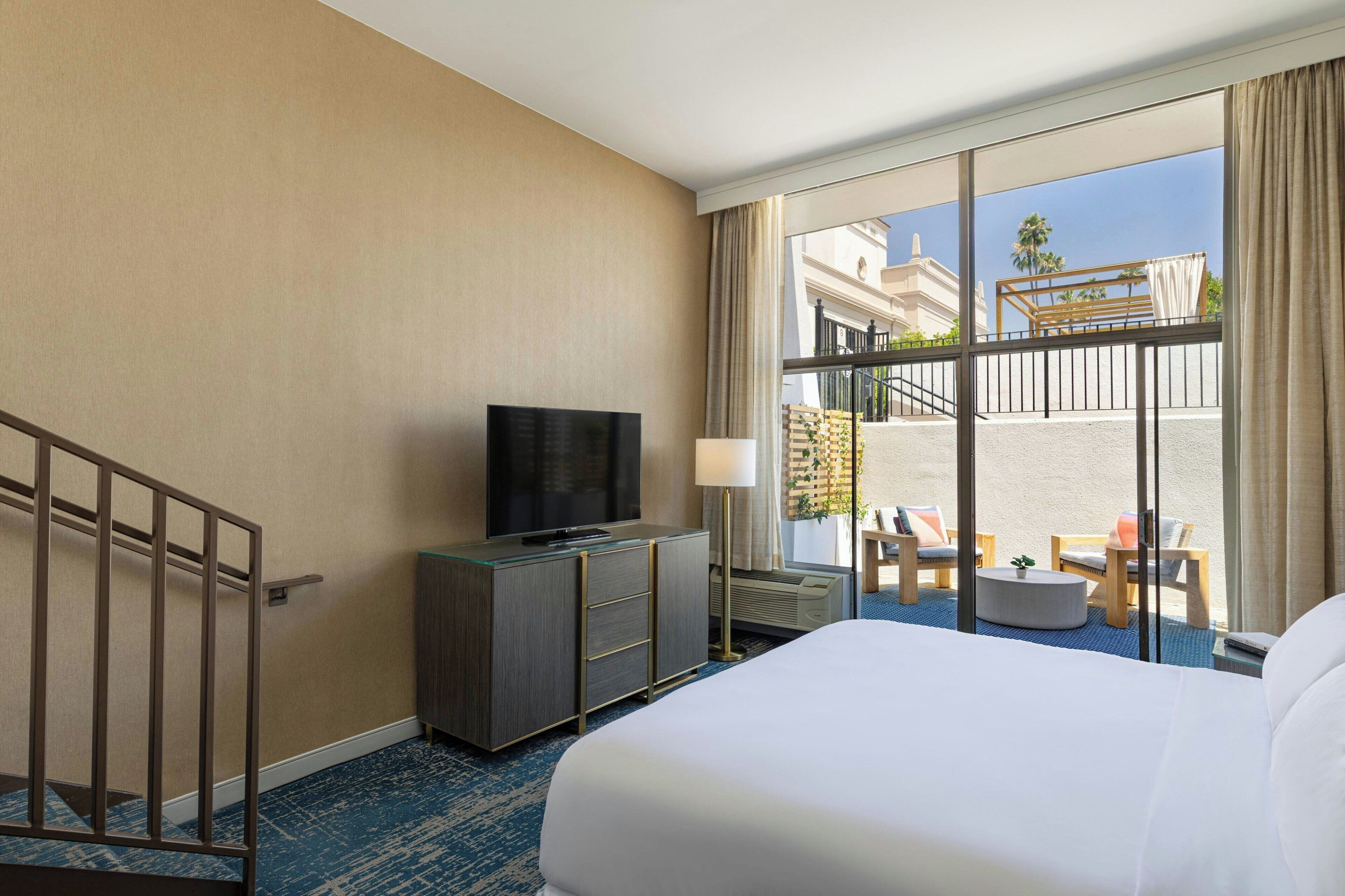 Premium bedding, down comforters, desk, laptop workspace