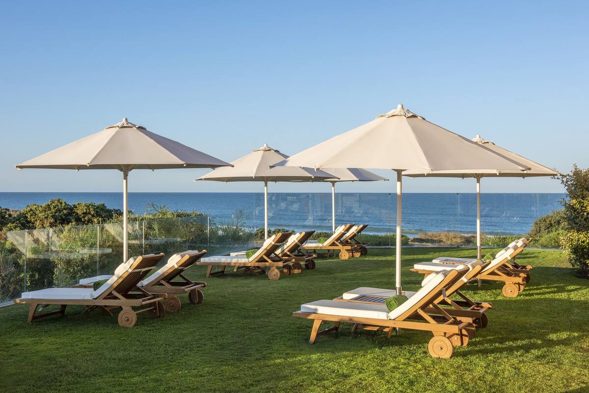 indoor pool, 2 outdoor pools, pool umbrellas, pool loungers