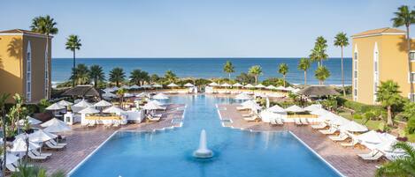 Indoor pool, 2 outdoor pools, pool umbrellas, pool loungers