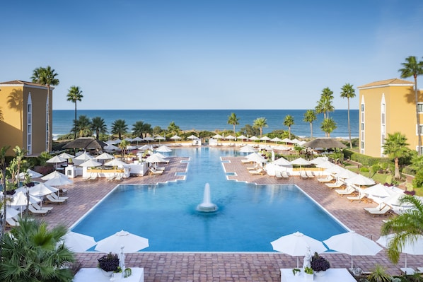 Indoor pool, 2 outdoor pools, pool umbrellas, sun loungers