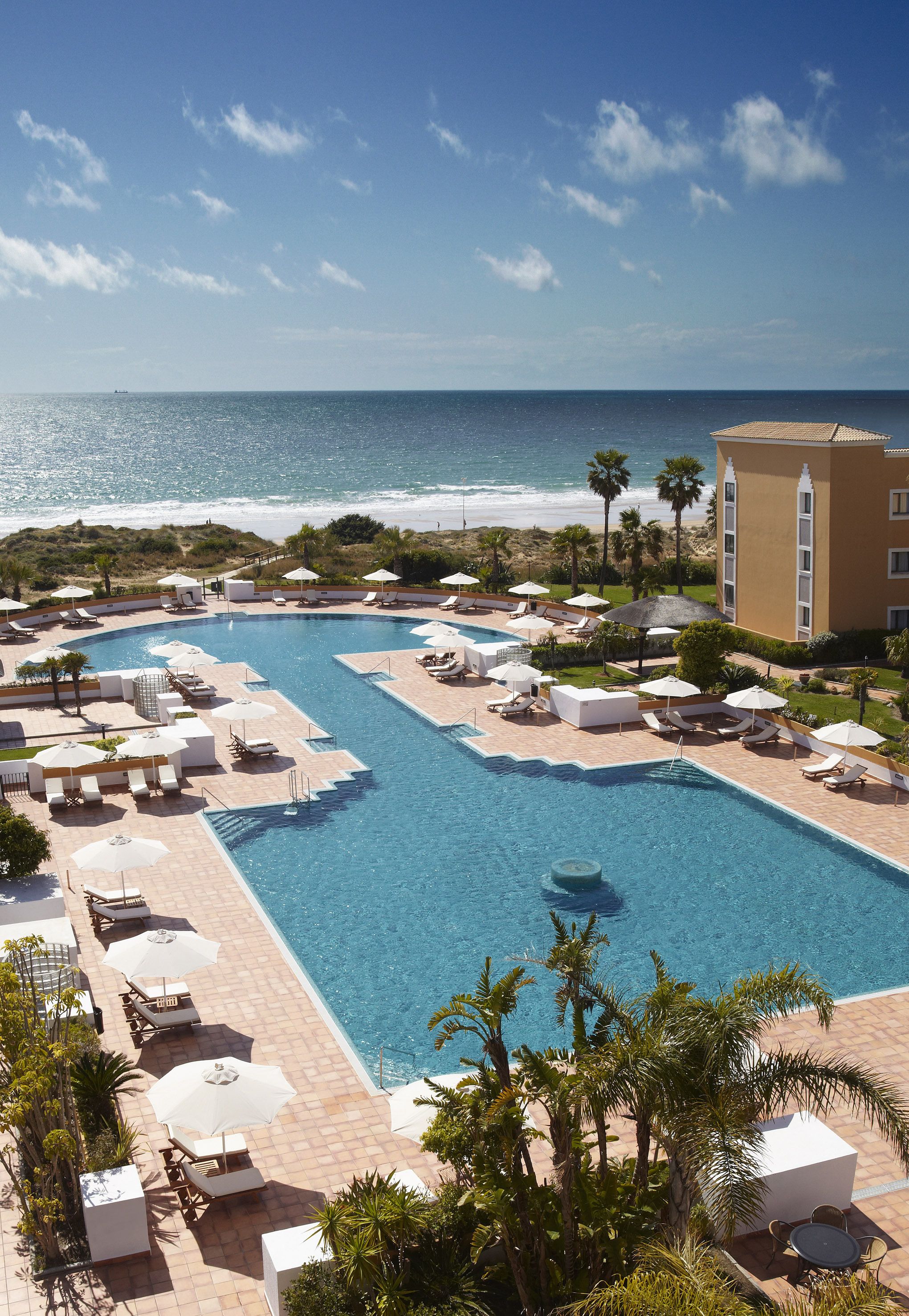 indoor pool, 2 outdoor pools, pool umbrellas, pool loungers