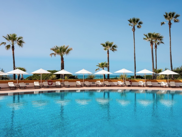Indoor pool, 2 outdoor pools, pool umbrellas, sun loungers