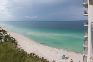 On the beach, beach cabanas, sun-loungers, beach umbrellas