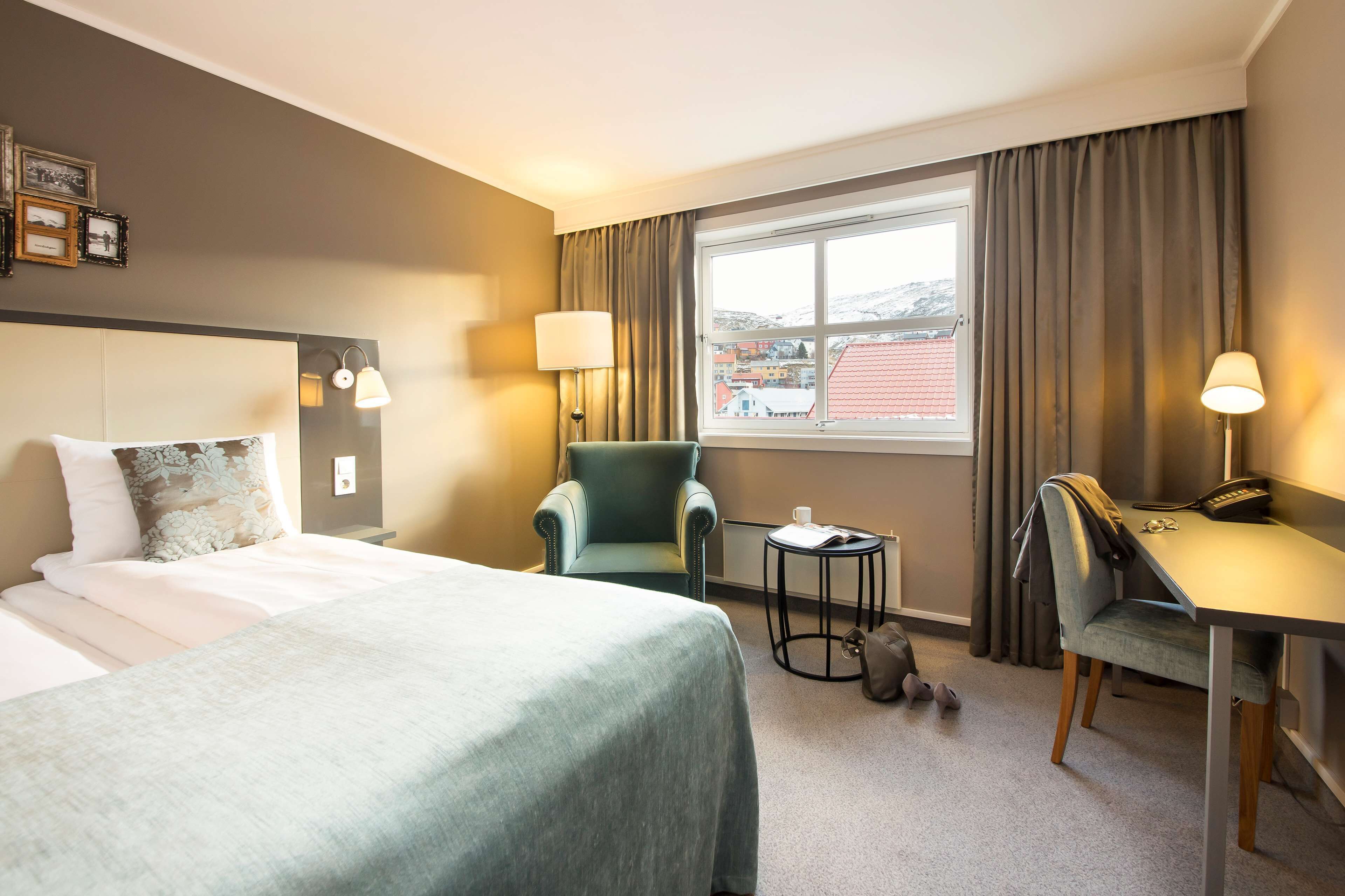 desk, blackout curtains, free cots/infant beds, free wifi