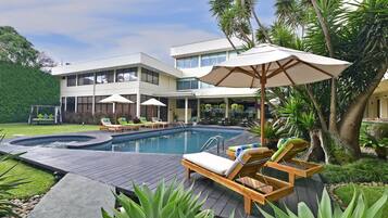Outdoor pool, open 6 AM to 9 PM, free pool cabanas, pool loungers