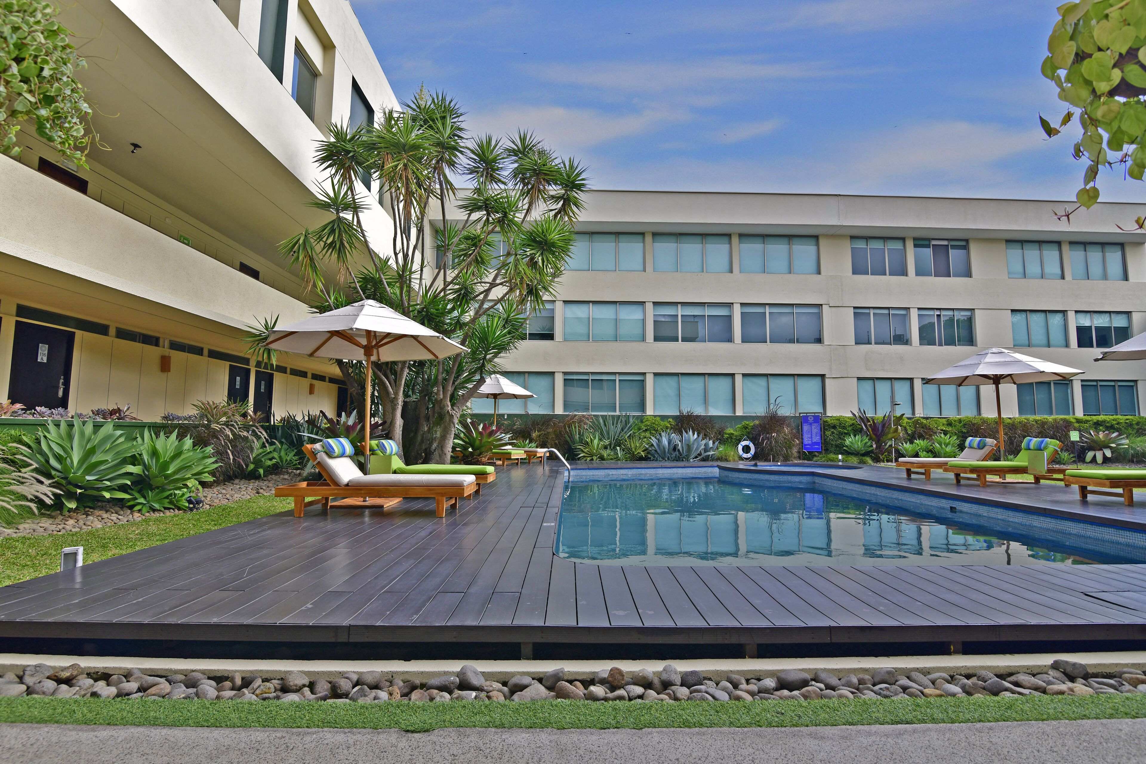 outdoor pool, open 6 am to 9 pm, free pool cabanas, pool loungers