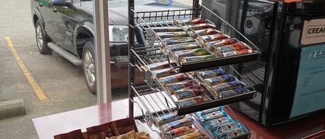 A display of Nutri Grain products and CITAVO chocolate bars at a store.