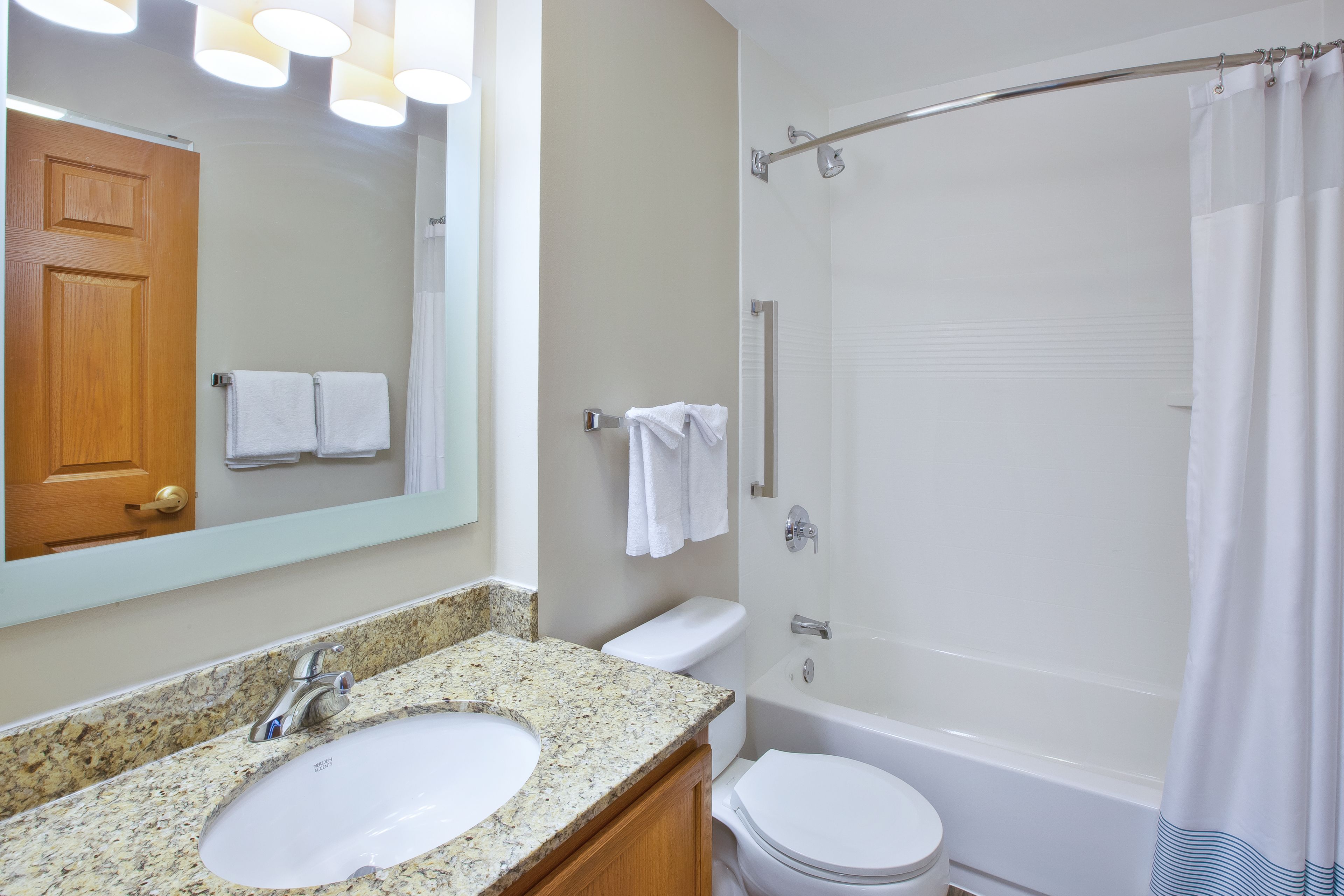 combined shower/bathtub, free toiletries, hair dryer, towels