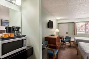 Desk, laptop workspace, blackout curtains, iron/ironing board