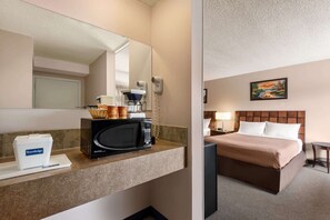 Desk, laptop workspace, blackout curtains, iron/ironing board - Travelodge by Wyndham Swift Current (Swift Current)
