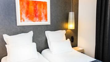 Habitación Confort, 2 camas individuales | 1 habitación, ropa de cama de alta calidad y minibar