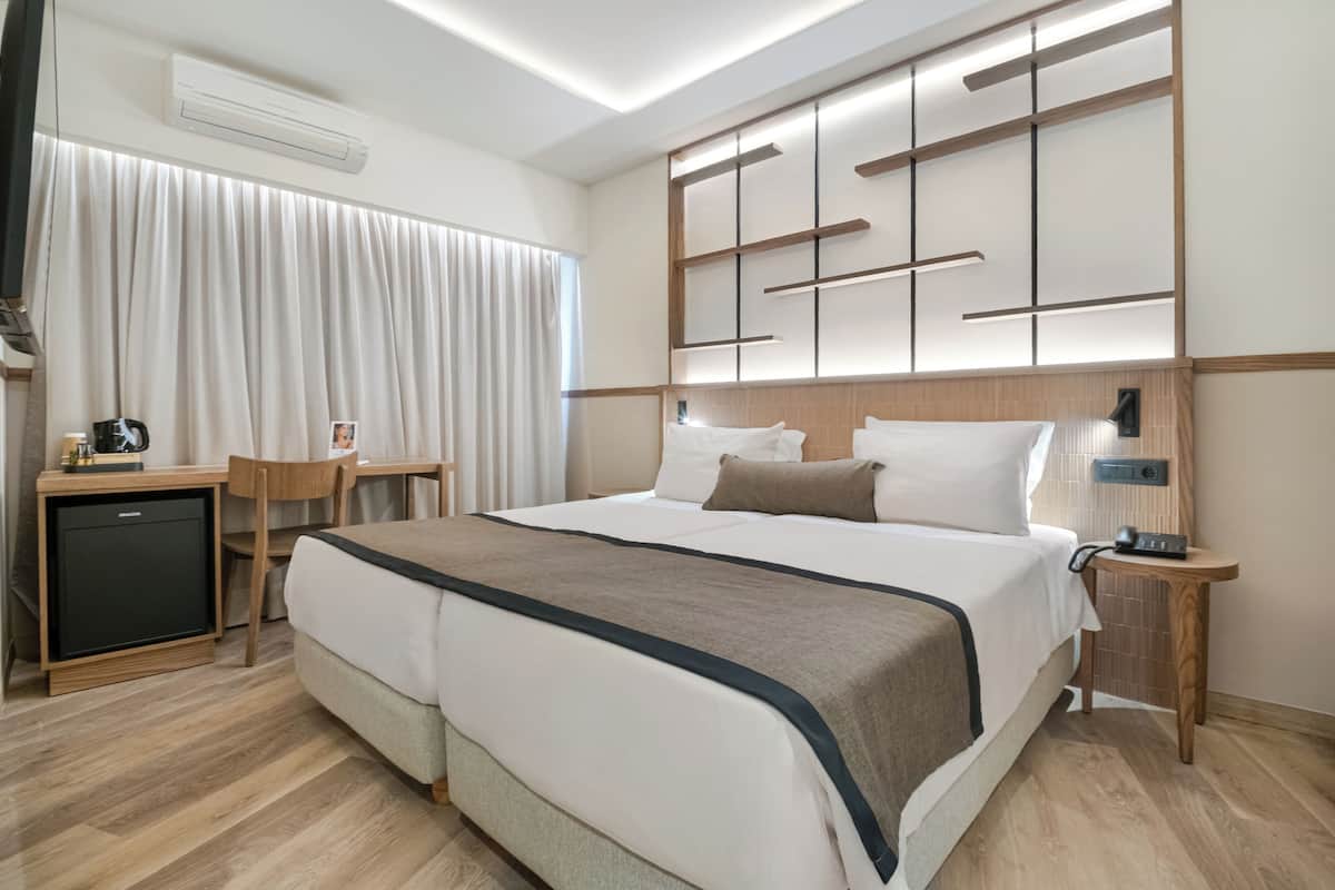 Economy Room (Special Offer) | 1 bedroom, down duvets, in-room safe, desk
