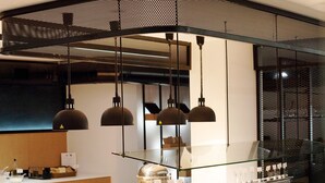 A buffet area with a variety of food options, including fruits and vegetables, and a coffee station. - Capsis Astoria Heraklion Hotel (Heraklion)