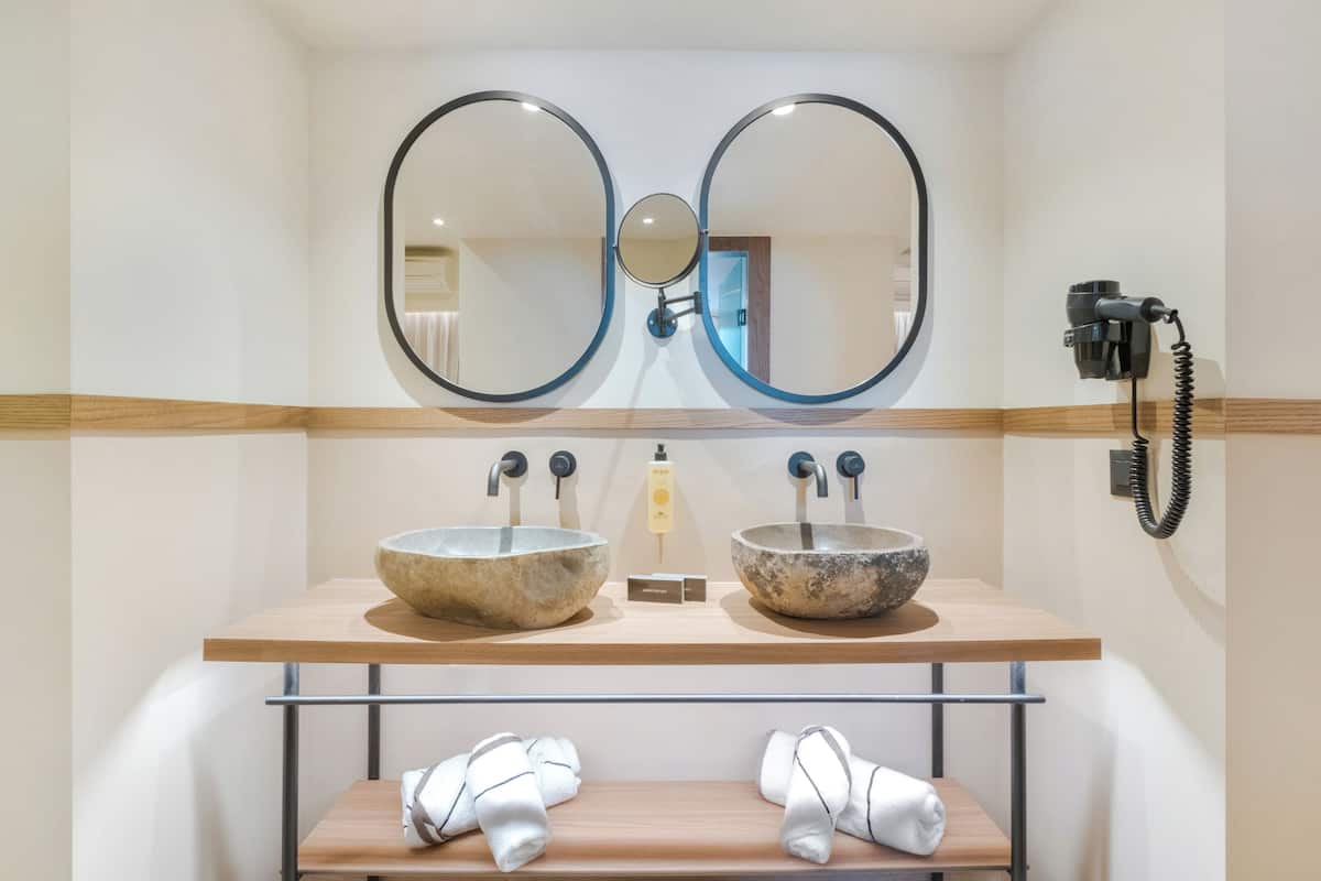 family room | bathroom | shower, free toiletries, hair dryer, slippers