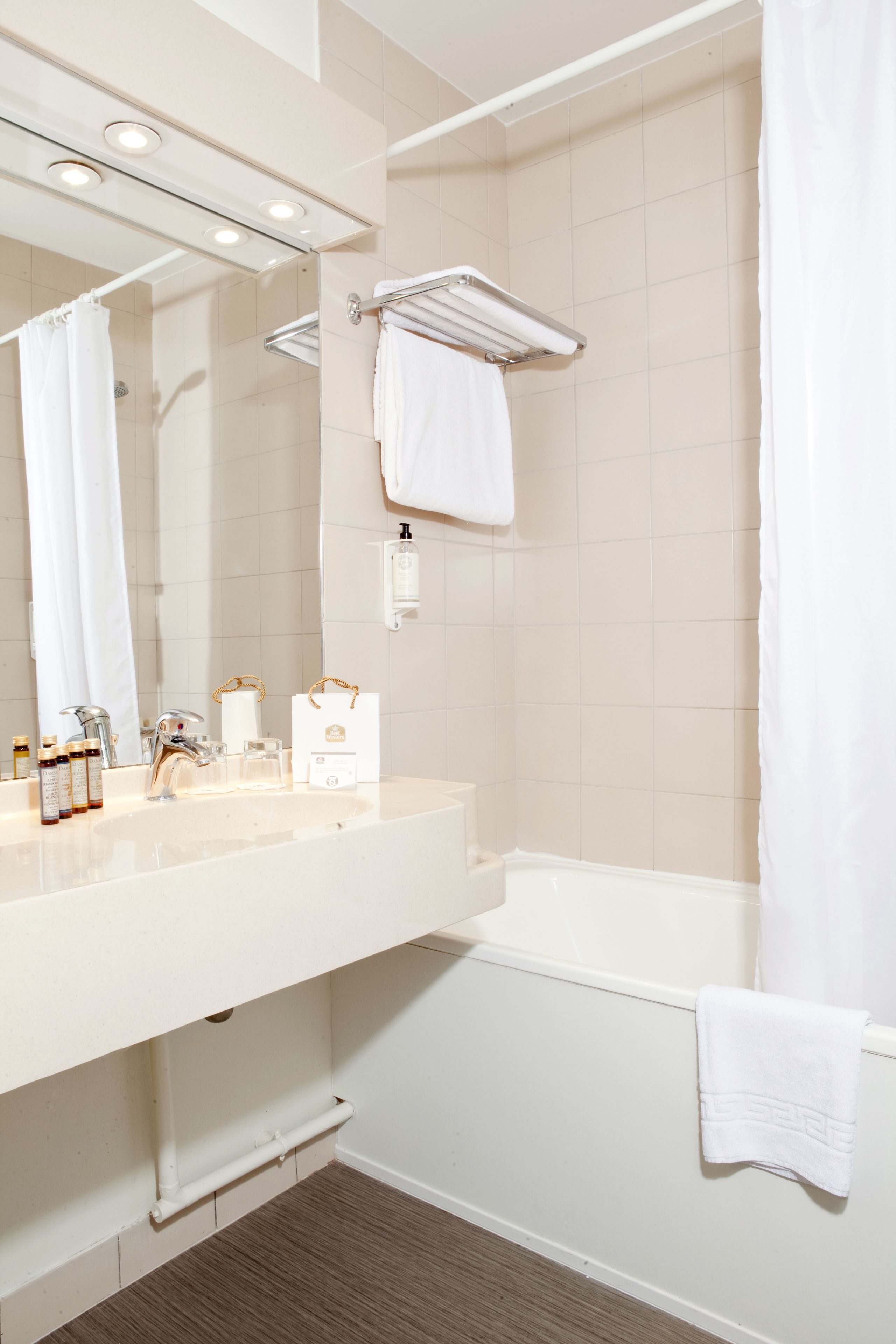 Bathtub, hair dryer, towels